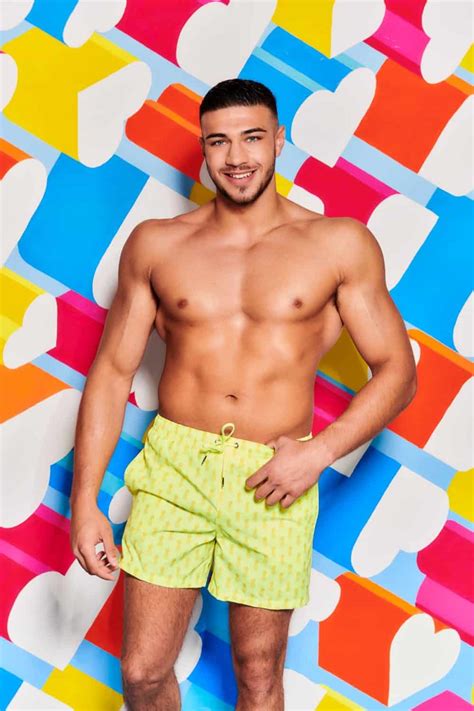 Love Island star Tommy Fury goes topless and beats chest on